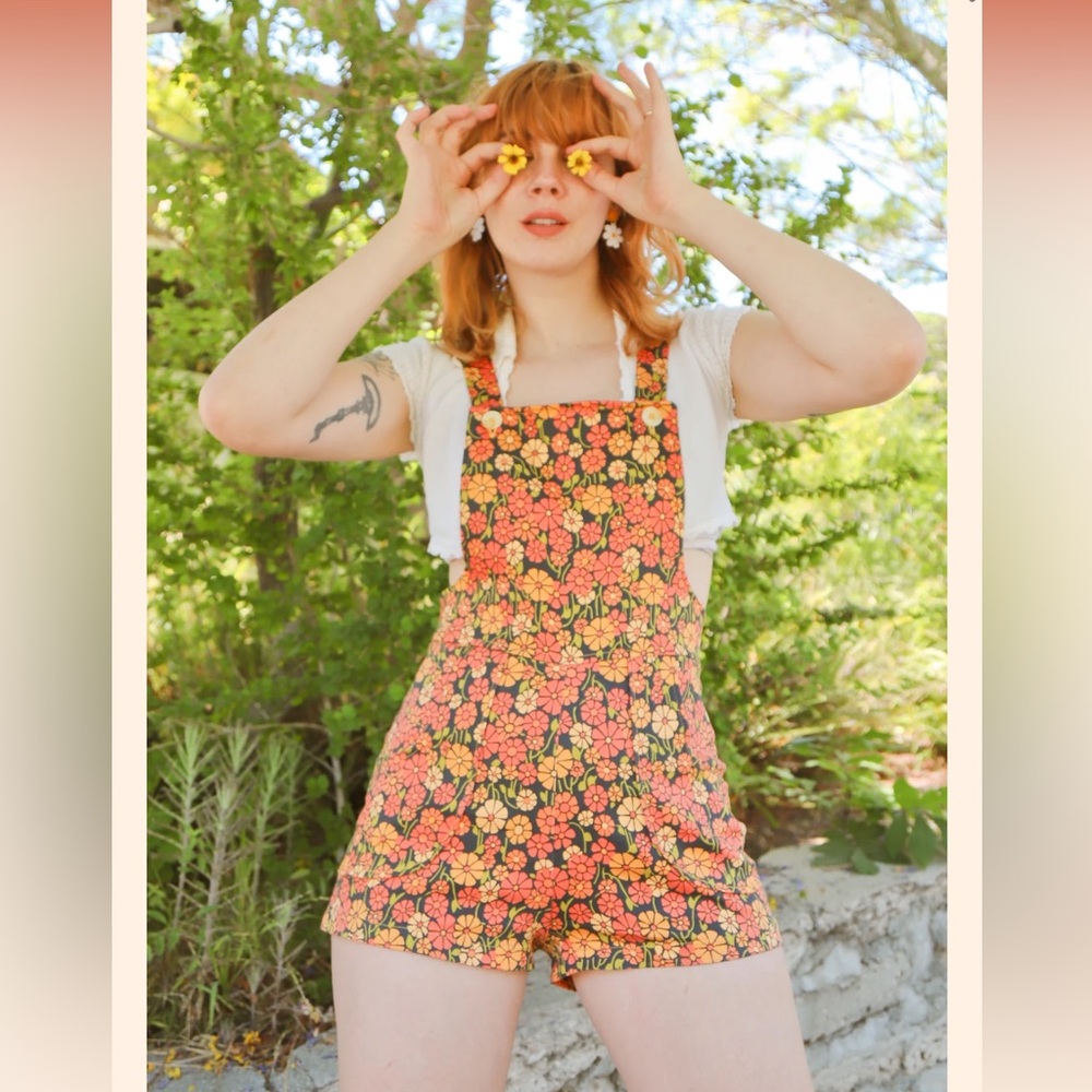 Miracle Eye Floral Romper with Orange and Yellow Accents